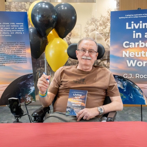 <p>Cambridge Manor resident, Greg, celebrates his newly published book!</p>
